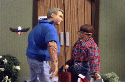 Man And Boy Standing In Front Of Door GIF