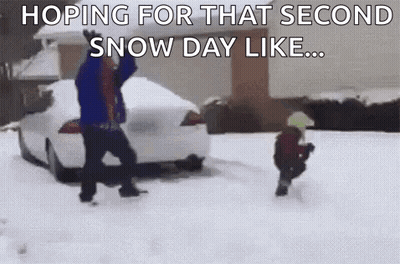 Man And Child Playing In Snow GIF