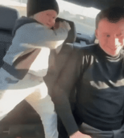 Man And Child Sitting In Car GIF