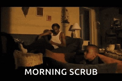 Man And Child Sitting On Couch Saying Morning Scrub GIF