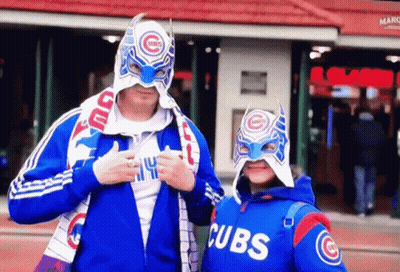 Man And Girl In Cubs Jackets And Masks GIF