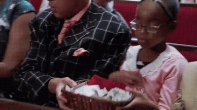 Man And Girl Sitting In Church With Basket Of Food GIF