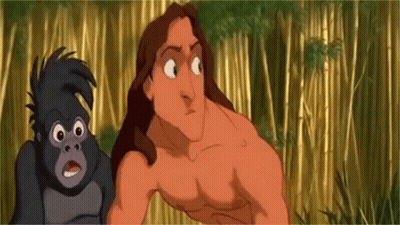 Man And Gorilla Standing Together GIF