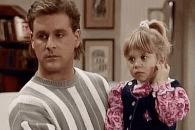 Man And Little Girl Sitting On Couch GIF