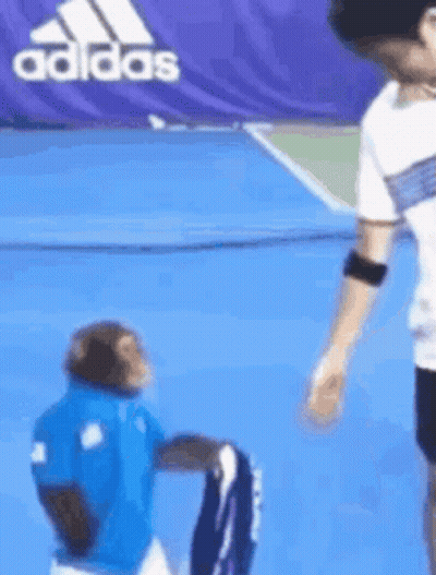 Man And Monkey Playing Tennis GIF