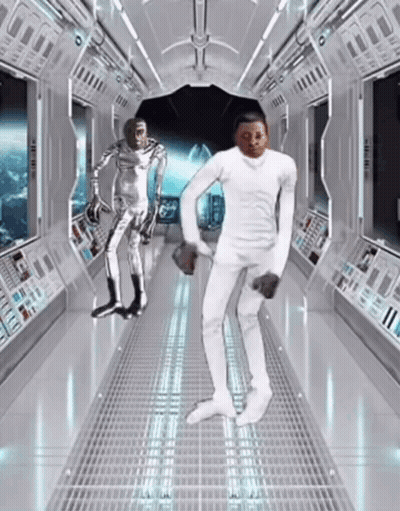 Man And Robot Dancing In Space Hallway GIF