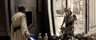Man And Robot With Lightsaber GIF