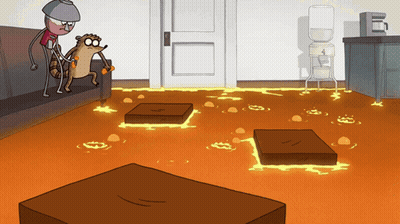 Man And Squirrel On Couch In Lava Living Room GIF