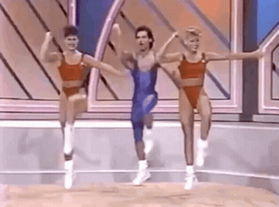 Man And Two Women Aerobics Stage GIF