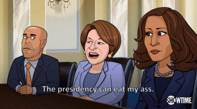 Man And Two Women At Table Saying The Presidency Can Eat My Ass GIF