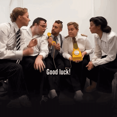 Man And Two Women At Table Saying They Want To Laugh GIF