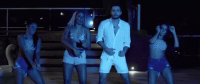 Man And Two Women Dancing In Dark Room GIF
