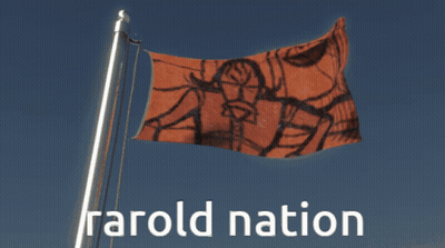 Man And Two Women Dancing In Front Of Rea New Sign GIF