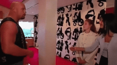 Man And Two Women In Front Of Black And White Letter Wall GIF