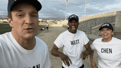Man And Two Women In White T-Shirts Saying West GIF