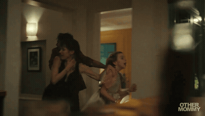 Man And Two Women Running In Front Of Mirror With Other Mommy GIF