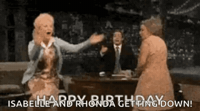 Man And Two Women Sitting At Table GIF