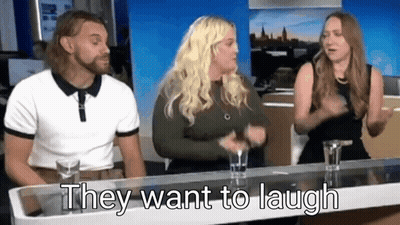 Man And Two Women Sitting At Table Saying They Want To Laugh GIF