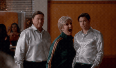 Man And Two Women Standing Together GIF