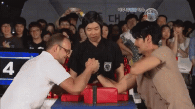 Man And Woman Arm Wrestling Crowd Number 4 GIF