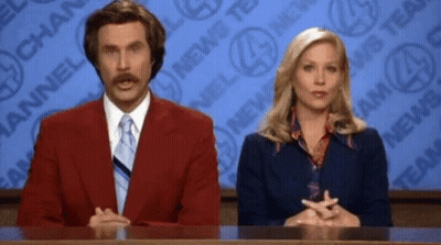 Man And Woman At Channel 4 News Desk GIF
