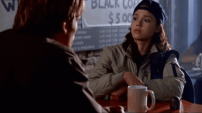 Man And Woman At Coffee Sign GIF