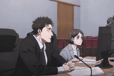 Man And Woman At Desk Looking At Computer GIF