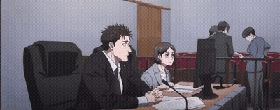 Man And Woman At Table In Courtroom GIF