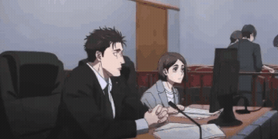 Man And Woman At Table With Microphone GIF