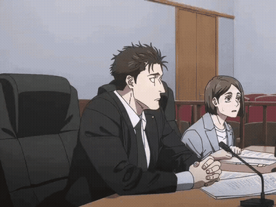 Man And Woman At Table With Papers And Microphone GIF