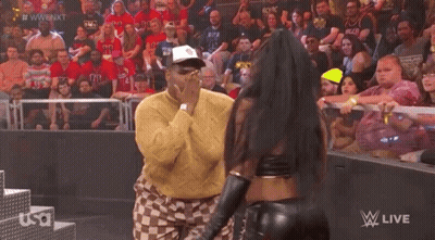 Man And Woman At Wrestling Show GIF