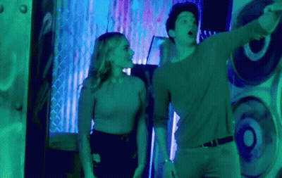 Man And Woman Beside Many Speakers GIF