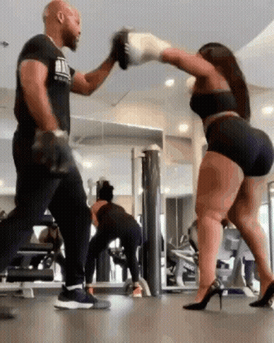 Man And Woman Boxing, Woman In High Heels GIF
