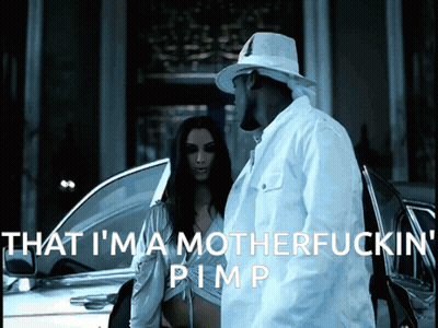 Man And Woman By Car Saying That I'm A Motherfucking Pimp GIF