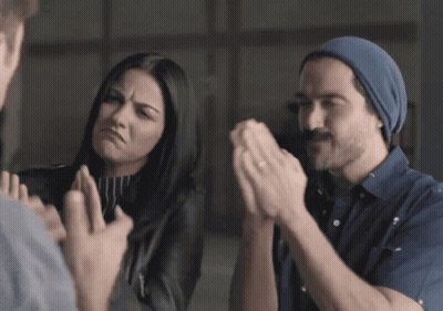 Man And Woman Clapping Hands In Room GIF