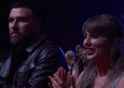 Man And Woman Clapping In Crowd GIF