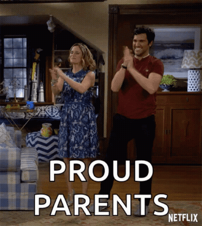 Man And Woman Clapping Proud Parents GIF