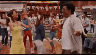 Man And Woman Dancing At Carnival GIF