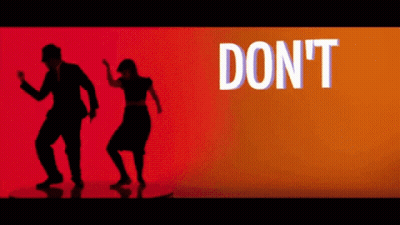 Man And Woman Dancing At Don't Sign GIF