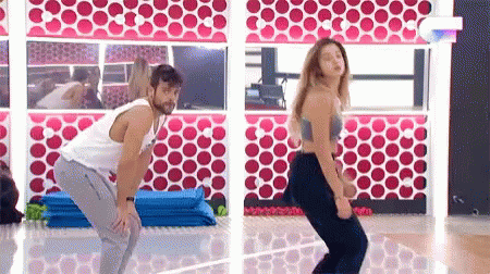 Man And Woman Dancing At Gym Mirror GIF