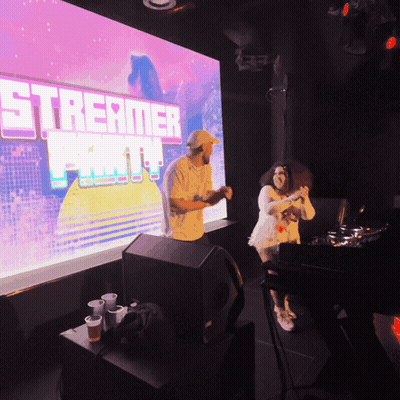 Man And Woman Dancing At Streamer Party GIF