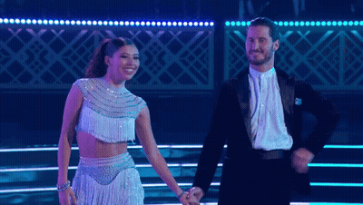 Man And Woman Dancing Holding Hands GIF