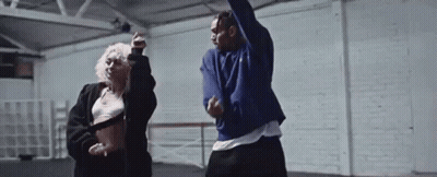 Man And Woman Dancing In A Dance Studio GIF