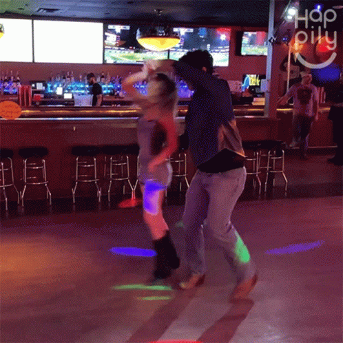 Man And Woman Dancing In Bar Hop Pily GIF