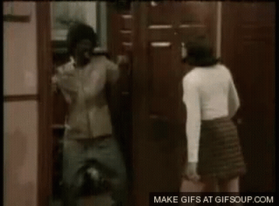 Man And Woman Dancing In Black And White Living Room GIF