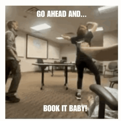 Man And Woman Dancing In Classroom Saying Go Ahead And Book It Baby GIF