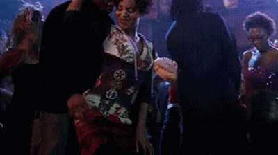 Man And Woman Dancing In Crowded Nightclub GIF