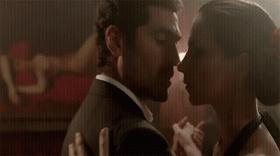 Man And Woman Dancing In Dark Room GIF