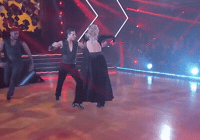 Man And Woman Dancing In Dark Room GIF