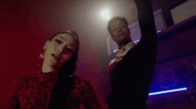 Man And Woman Dancing In Dark Room GIF